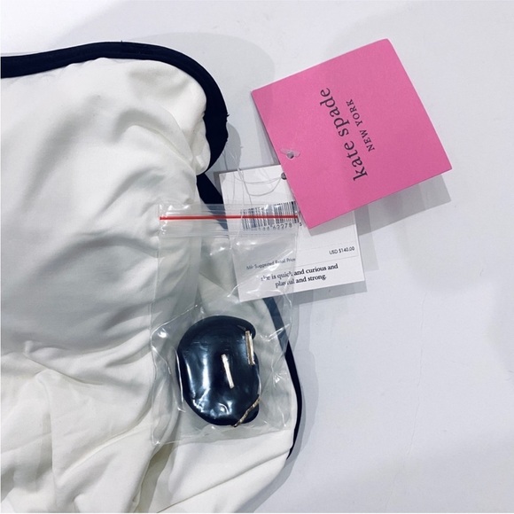 Kate Spade Texture Classic Bandeau
Swimsuit with signature spade buttons NWT - Picture 6 of 9
